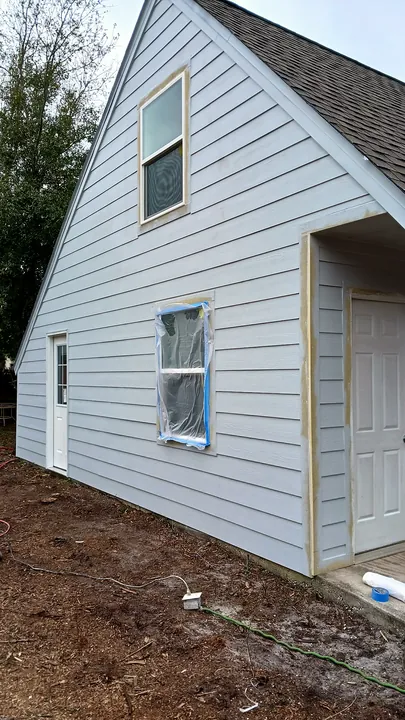 New lap siding installed and primed